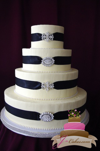 Wedding Cake with Ribbon and Brooches