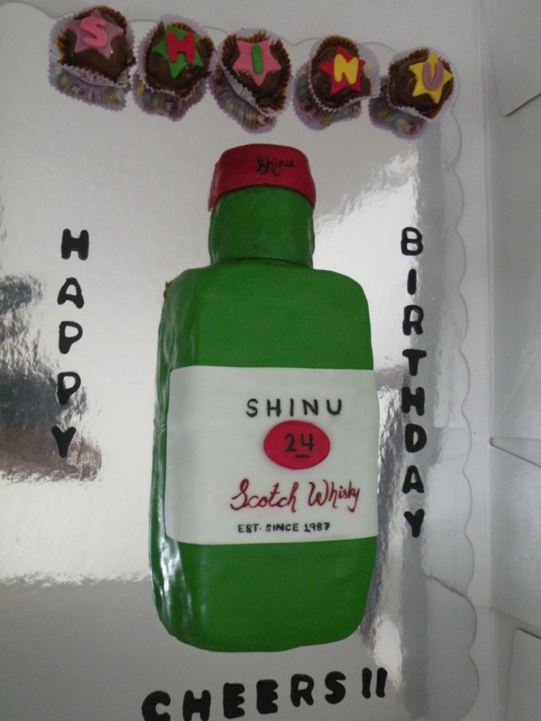 Whiskey Bottle Shaped Cake