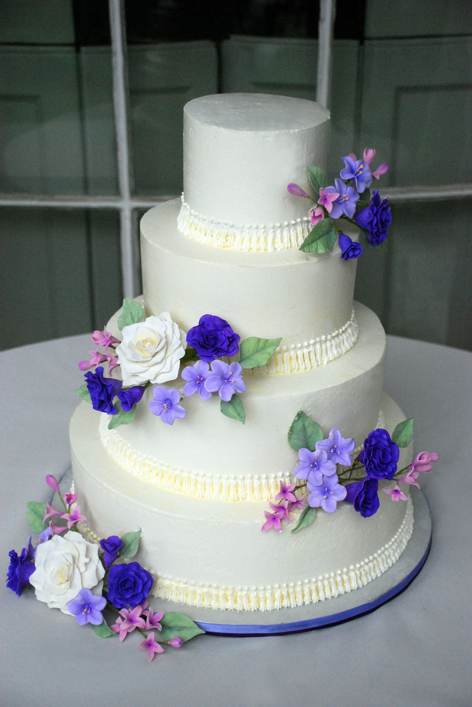 Buttercream Wedding Cake with Purple Flowers