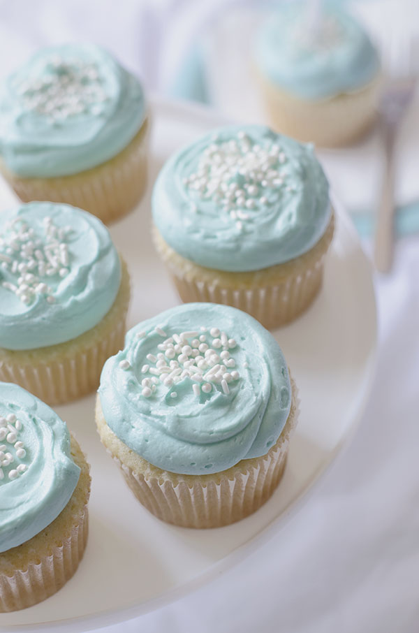 Light Blue Cupcakes with Vanilla Frosting