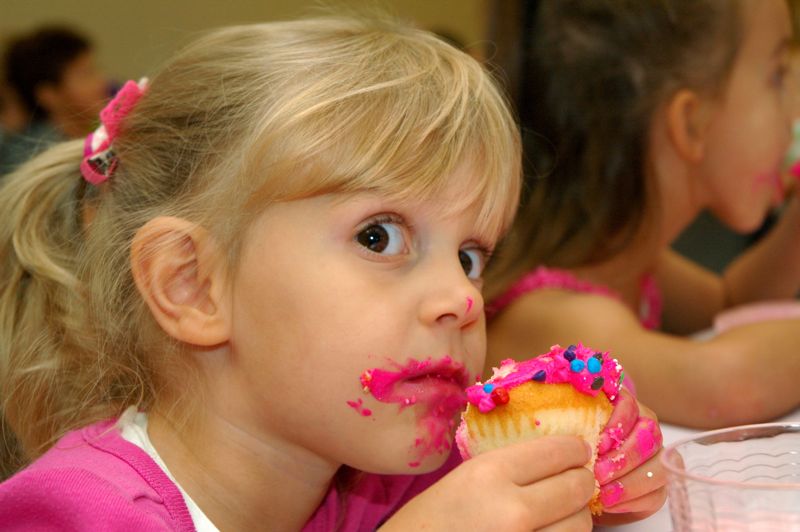Little Kid Eating Cupcake Little Kid Eating Cupcake