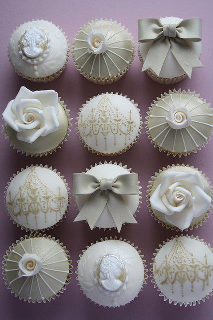 White and Gold Wedding Cake with Cupcakes White and Gold Wedding Cake with Cupcakes