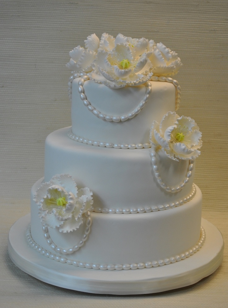 White Wedding Cake with Fondant Flowers White Wedding Cake with Fondant Flowers